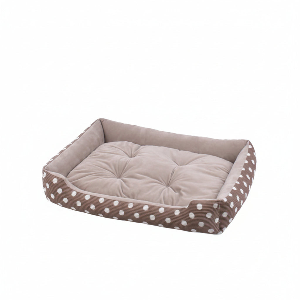 brown pet bed with white polka dot pattern
