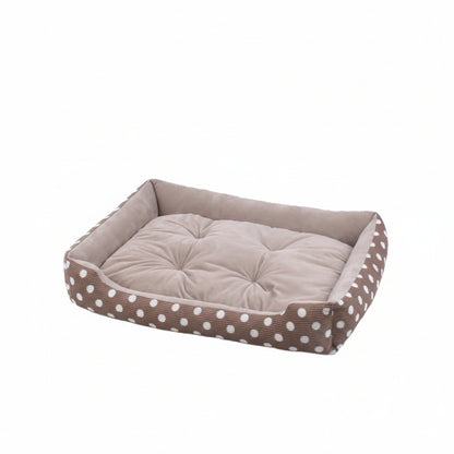 brown pet bed with white polka dot pattern